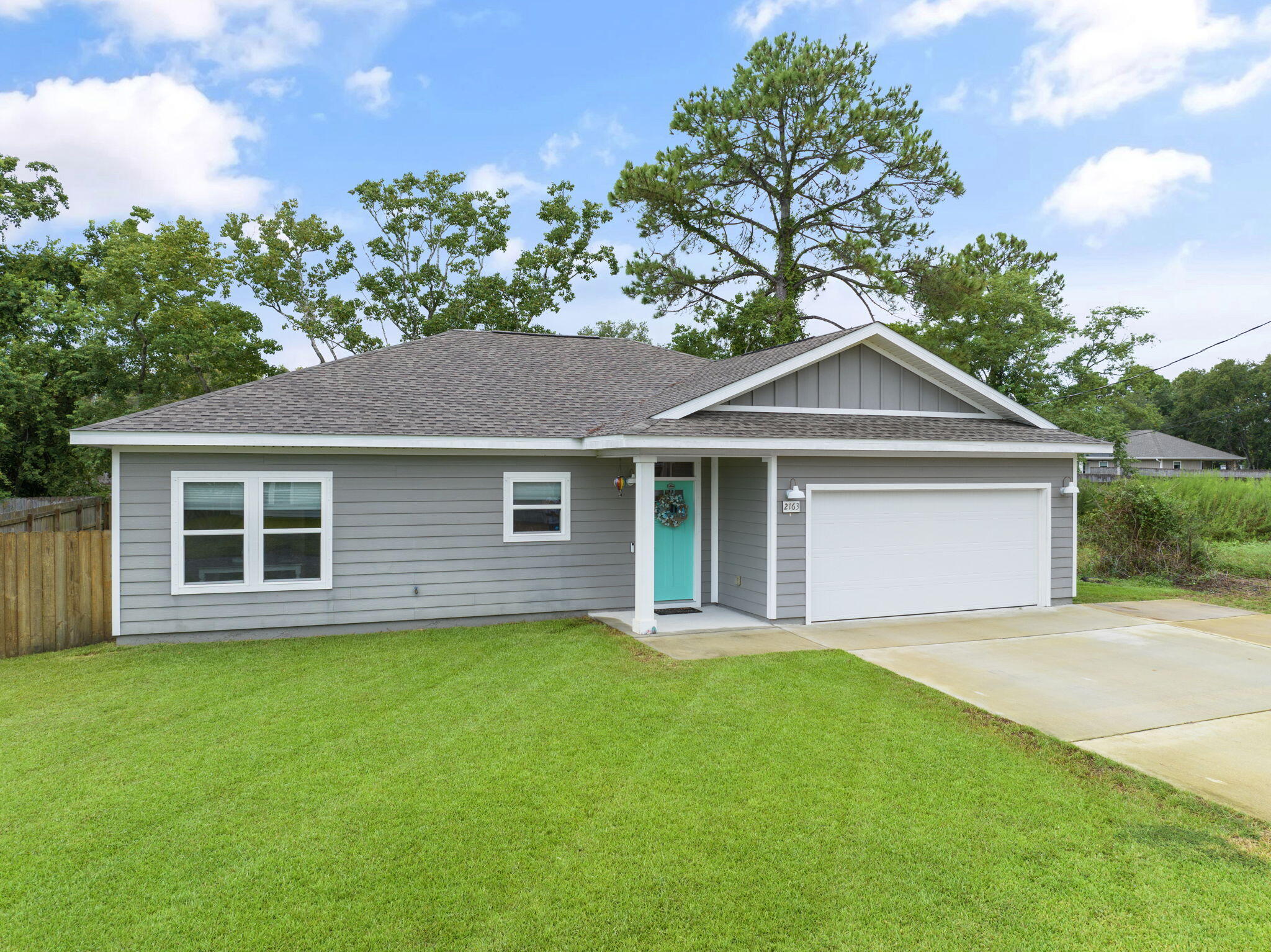 2163 Wind Trace Road North Navarre, FL 32566 - Photo 3 of 31 hurricane shutters included