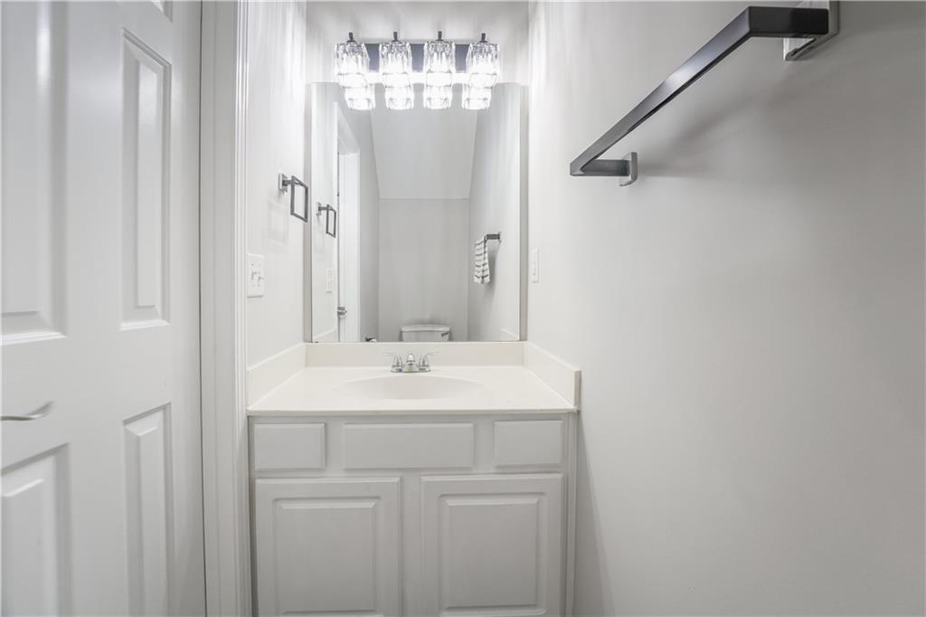 5331 Sherwin Drive Norcross, GA 30093 - Photo 11 of 29 a bathroom with a sink and mirror