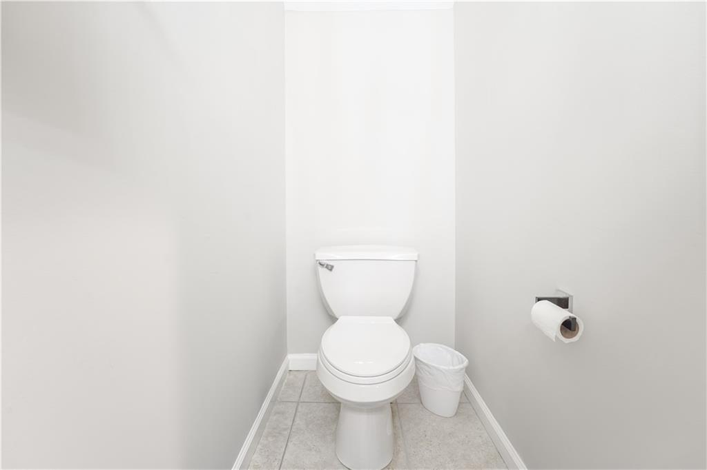 5331 Sherwin Drive Norcross, GA 30093 - Photo 12 of 29 a white toilet sitting next to a white wall