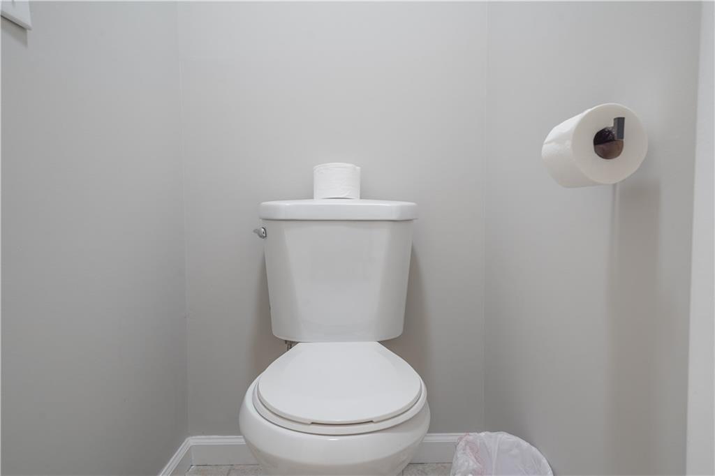 5331 Sherwin Drive Norcross, GA 30093 - Photo 21 of 29 a white toilet sitting next to a white sink