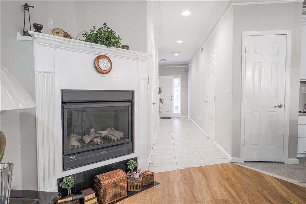 5331 Sherwin Drive Norcross, GA 30093 - Photo 10 of 29 a view of a livingroom with wooden floor and a fireplace