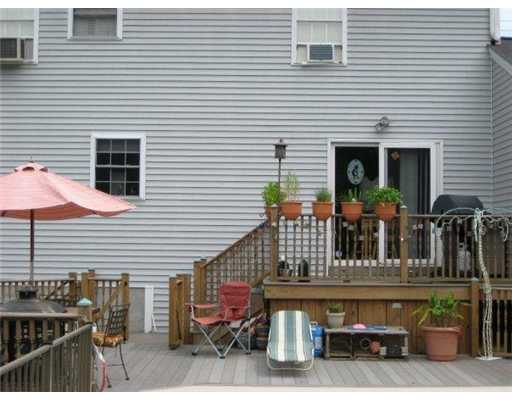 254 Curran Road Cumberland, RI 02864 - Photo 4 of 5 Exterior Back. Multi-level decks leading to pool.