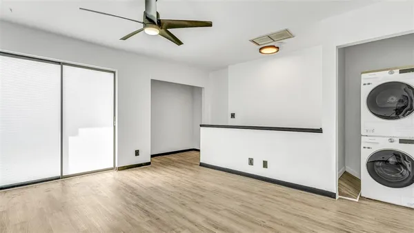 a view of a storage & utility room with wooden floor