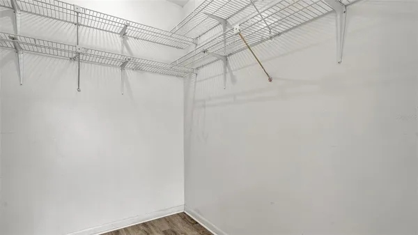 a view of a room with racks on the wall