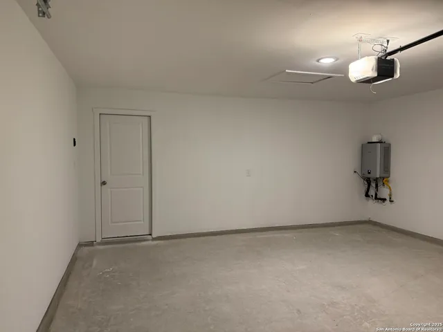 an empty room with a bench