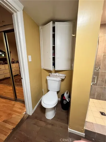 a bathroom with a toilet and a sink