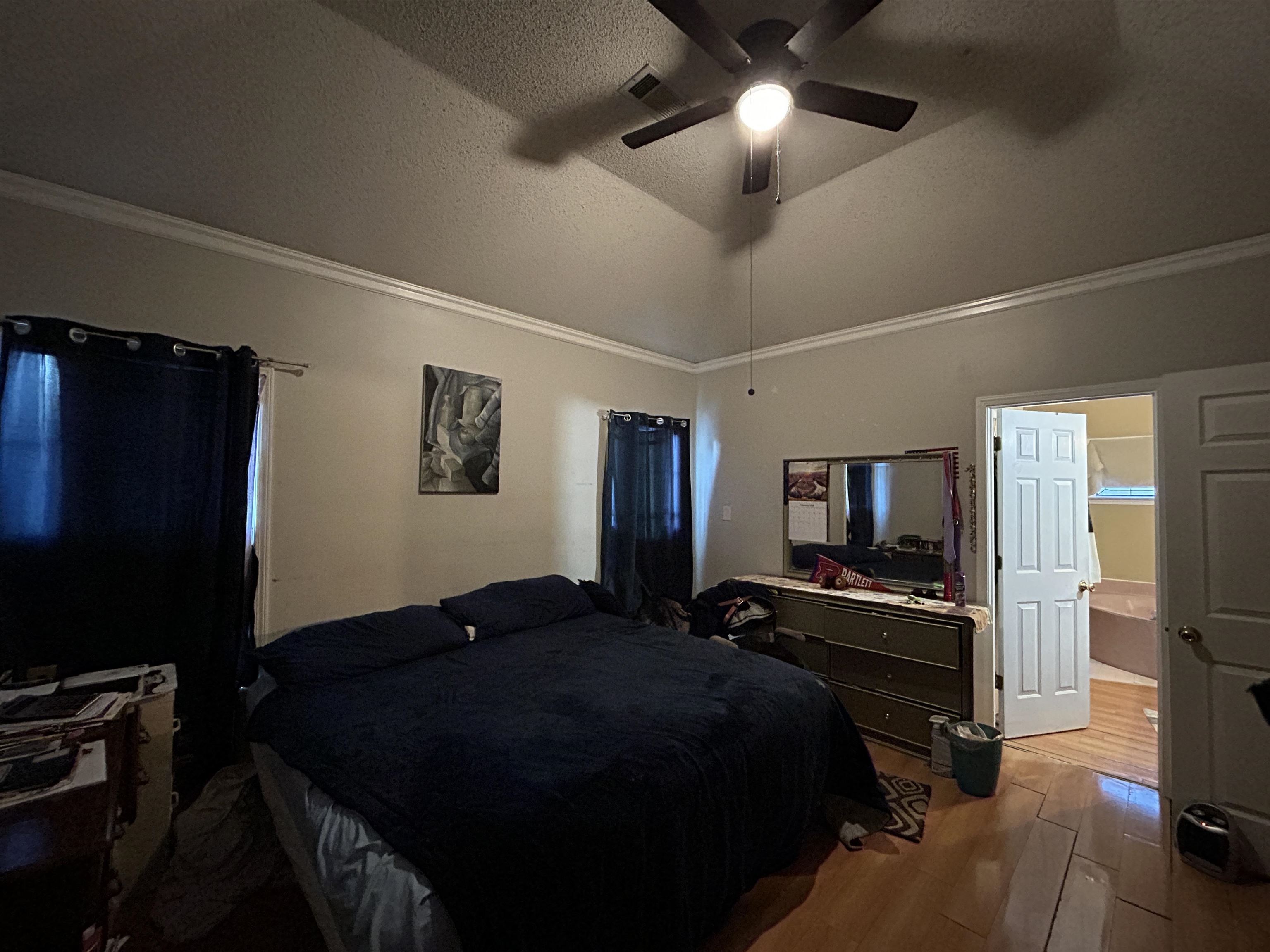 741 North Sanga Road Memphis, TN 38018 - Photo 13 of 13 Bedroom featuring crown molding, wood finished floors, and a ceiling fan