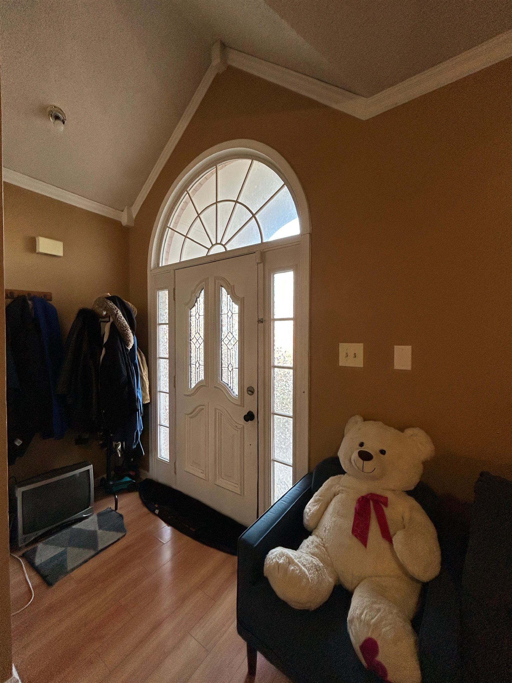 741 North Sanga Road Memphis, TN 38018 - Photo 4 of 13 Entryway with ornamental molding and wood finished floors