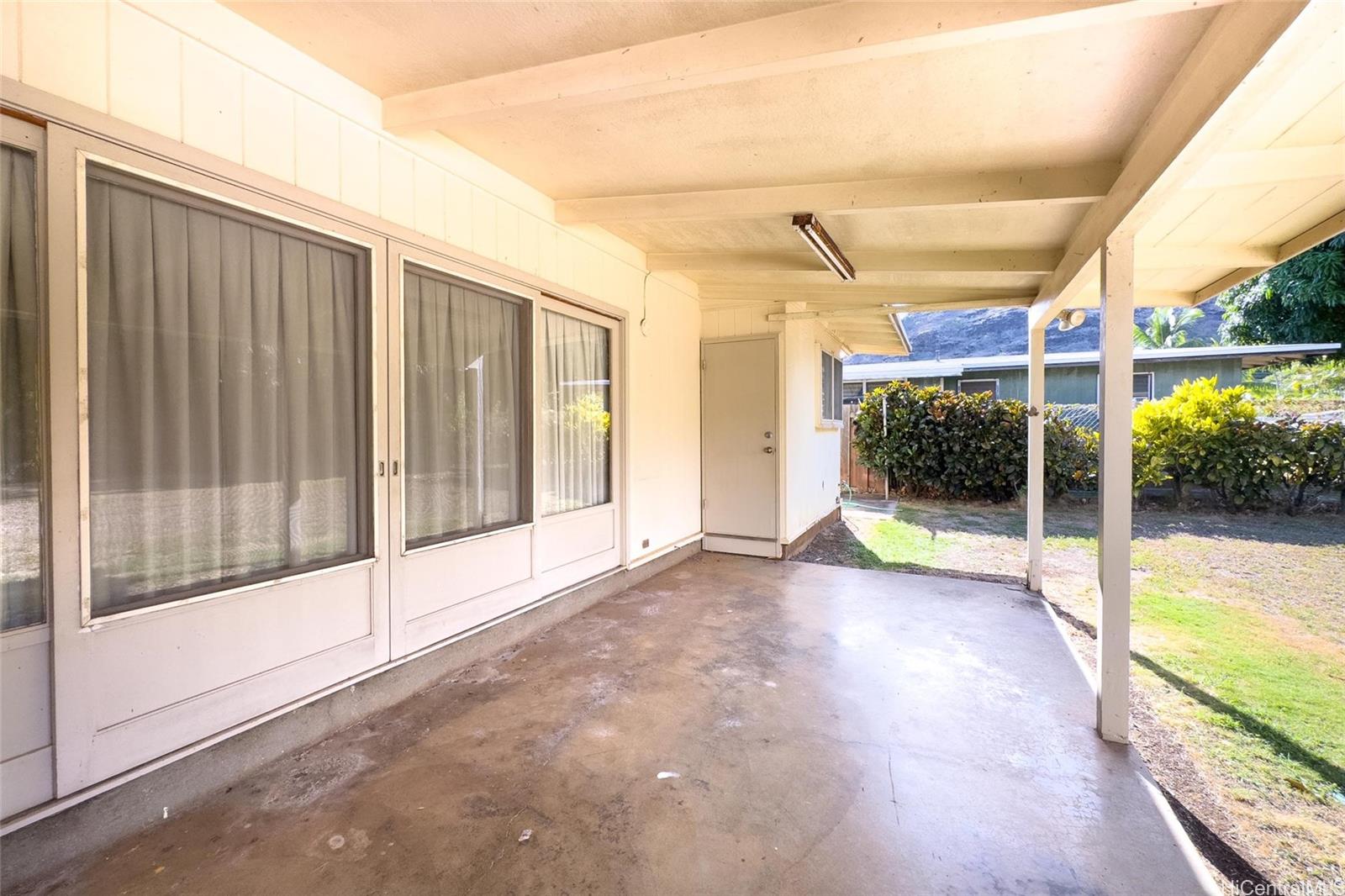 5558 Pia Street Honolulu, HI 96821 - Photo 18 of 25 a view of a room with gym equipment