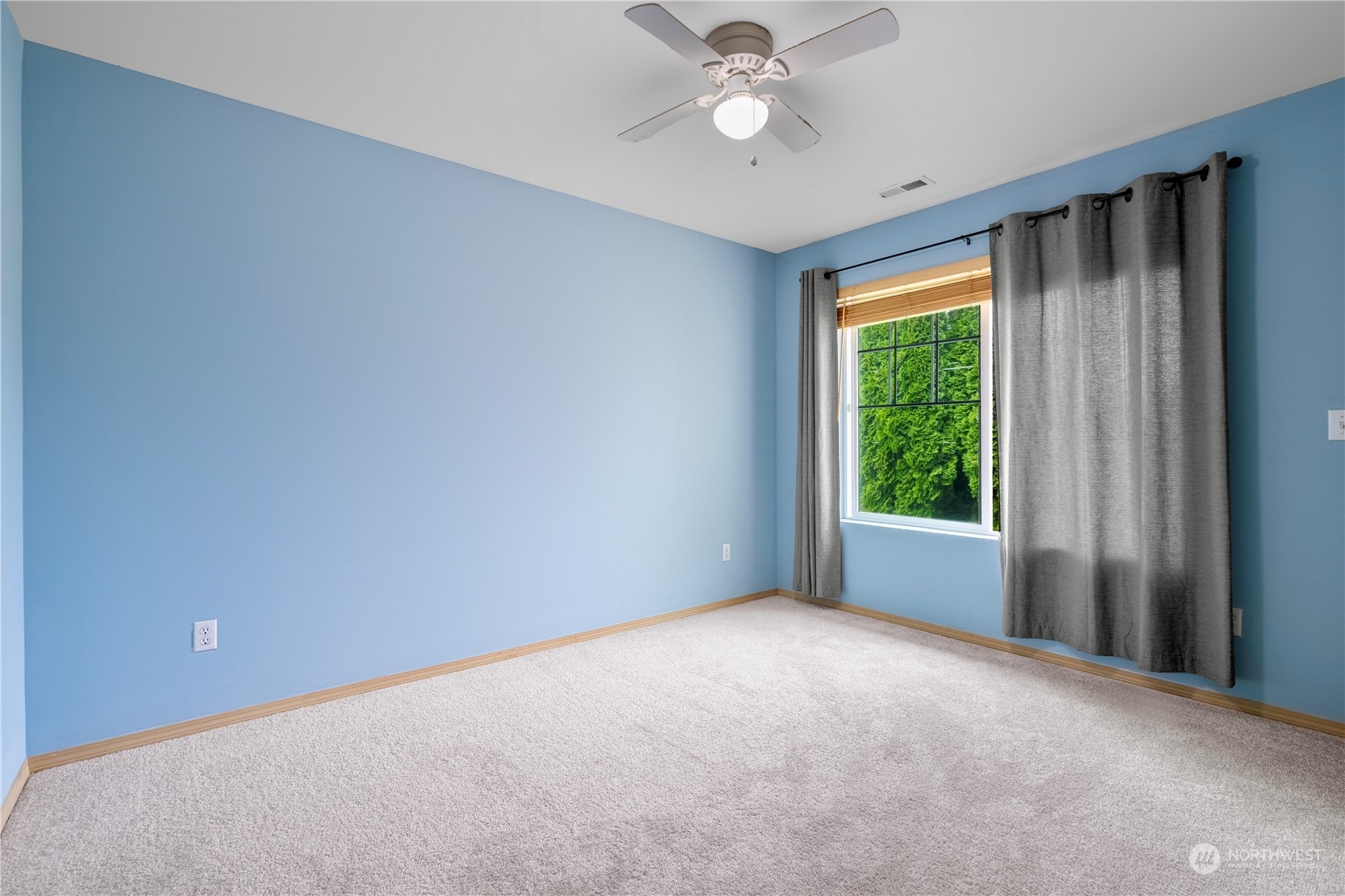 15513 38th Drive Southeast Bothell, WA 98012 - Photo 17 of 25 a view of an empty room with a window