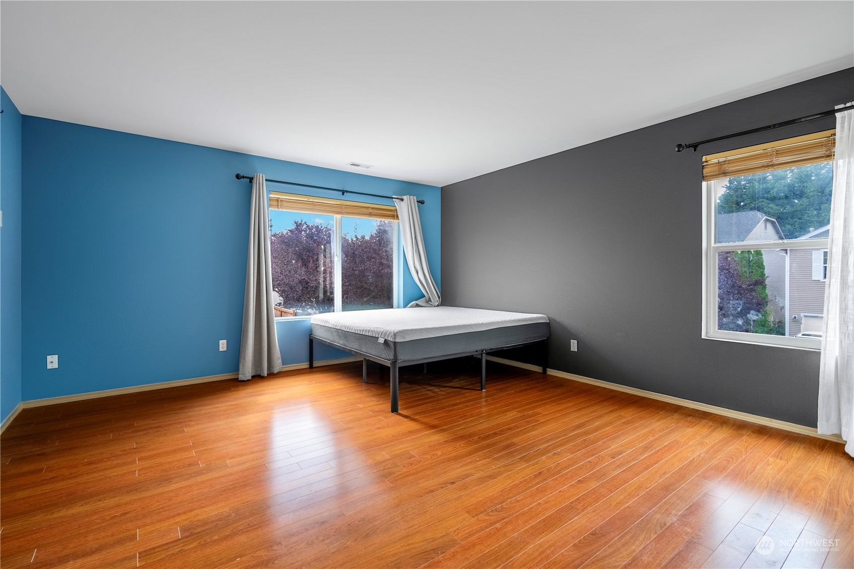 15513 38th Drive Southeast Bothell, WA 98012 - Photo 19 of 25 a bedroom with a bed and a window