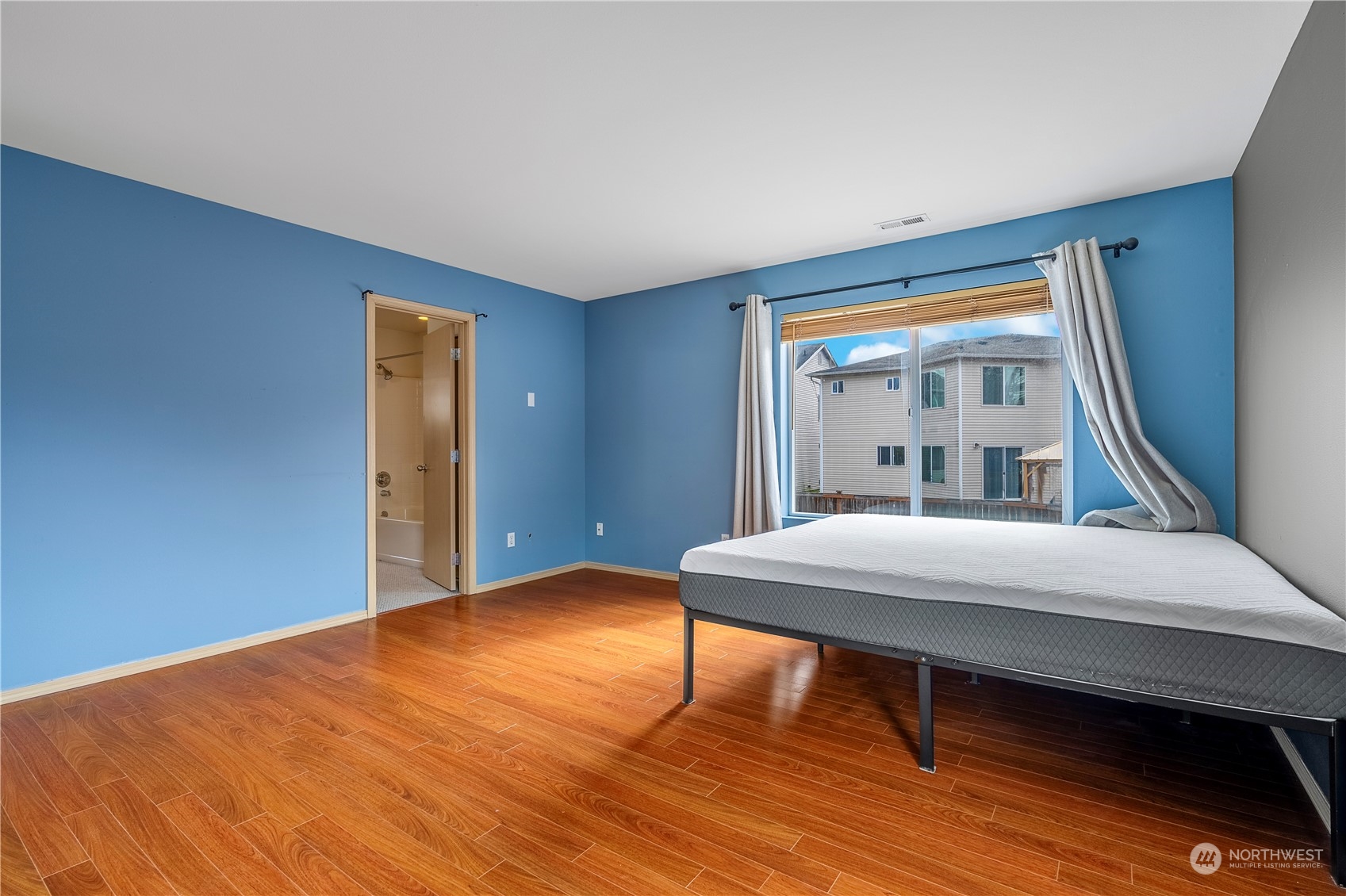 15513 38th Drive Southeast Bothell, WA 98012 - Photo 20 of 25 a room with a bed and a table