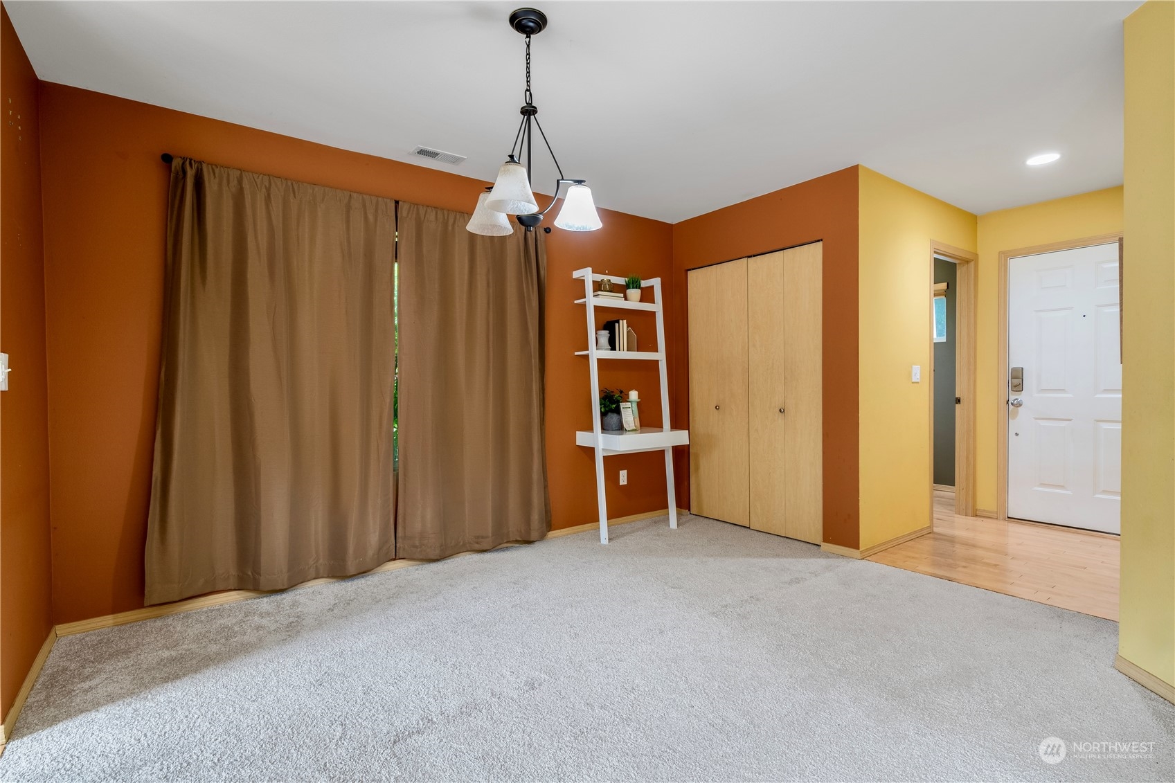 15513 38th Drive Southeast Bothell, WA 98012 - Photo 3 of 25 a view of a livingroom with a furniture window and a ceiling fan