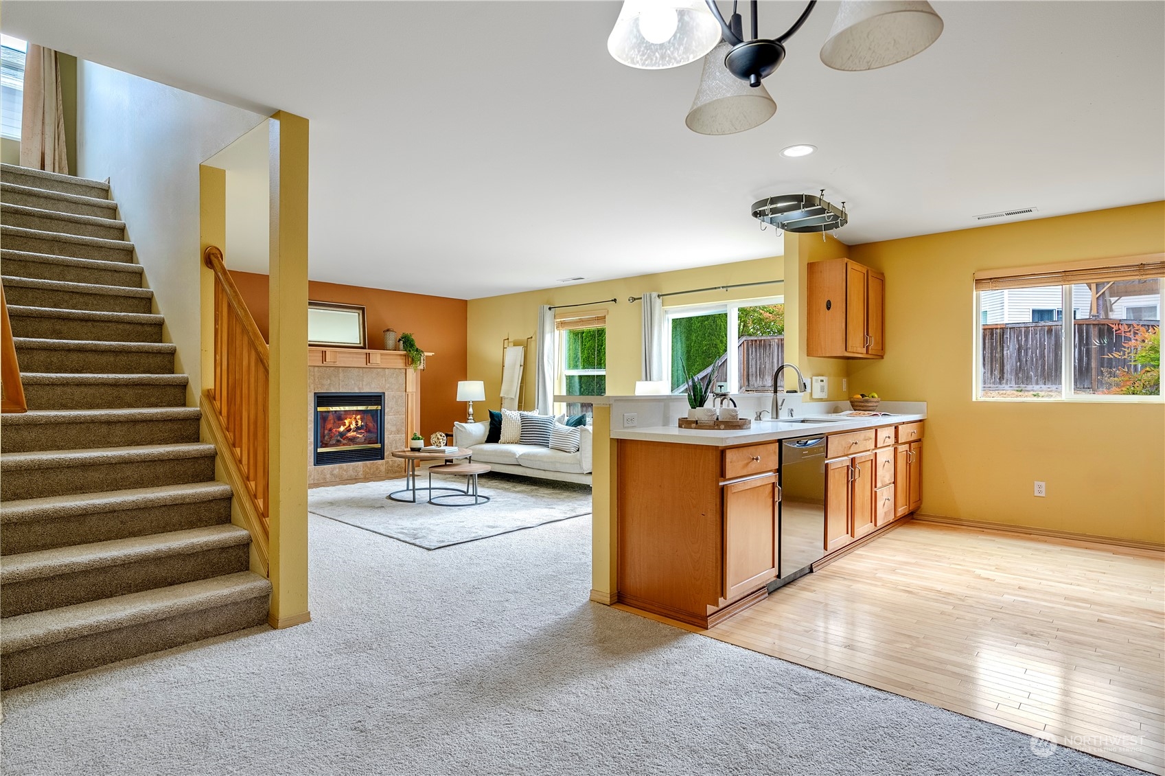 15513 38th Drive Southeast Bothell, WA 98012 - Photo 5 of 25 a view of living room with kitchen island furniture and a ceiling fan