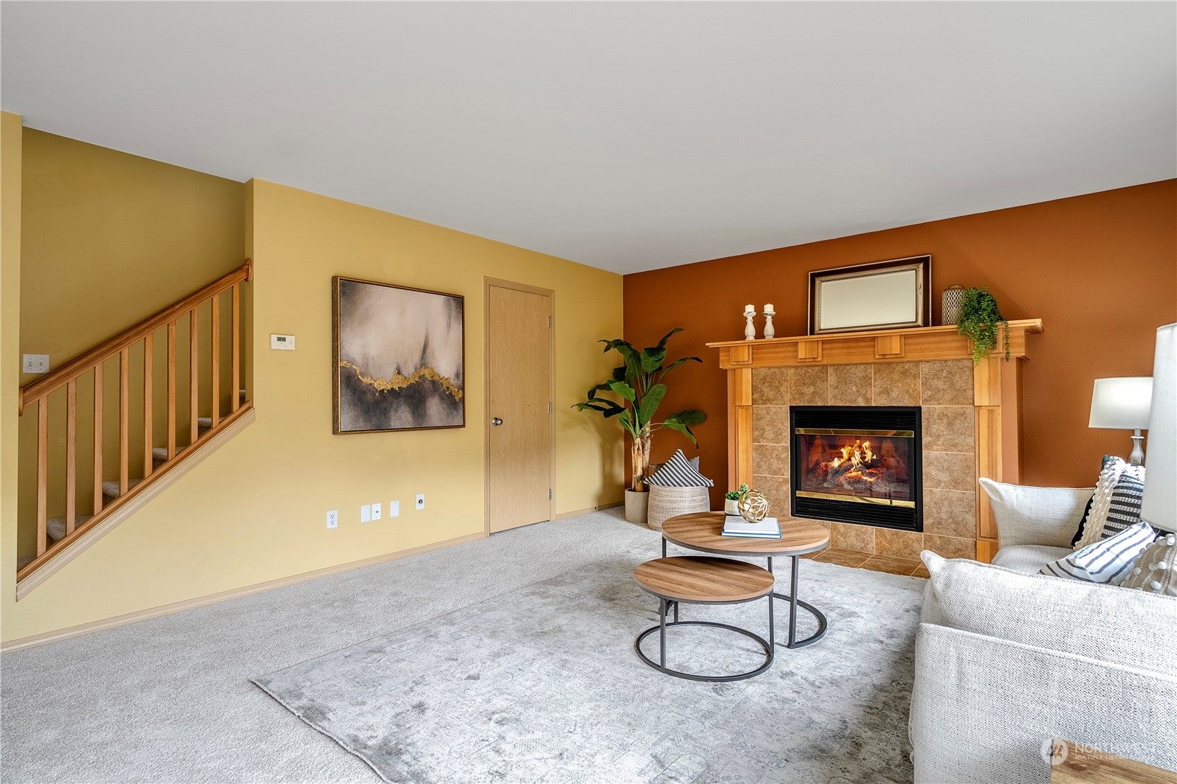 15513 38th Drive Southeast Bothell, WA 98012 - Photo 8 of 25 a living room with furniture and a fireplace