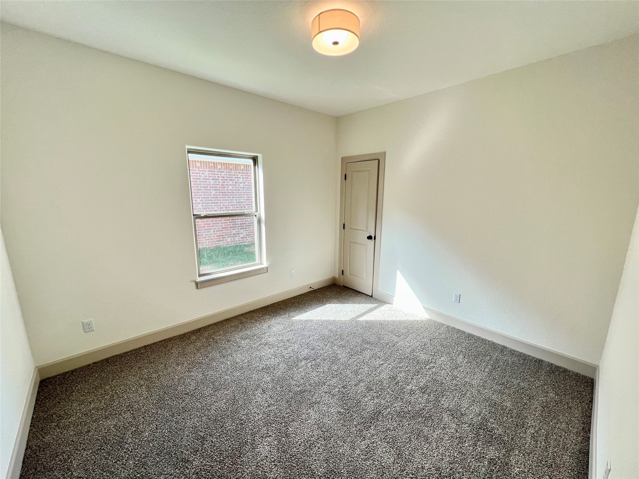 1003 South Anderson Street Angleton, TX 77515 - Photo 13 of 20 an empty room with windows