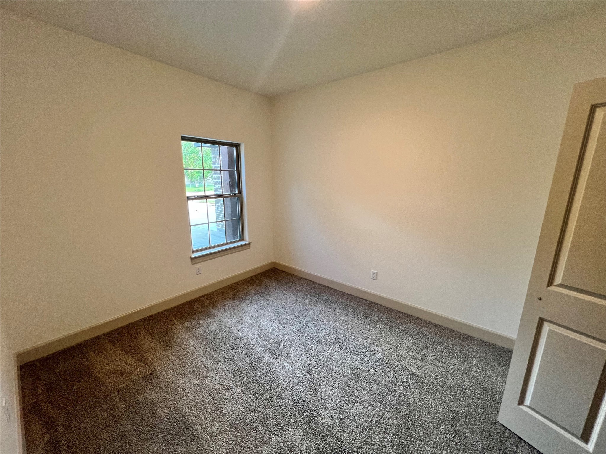 1003 South Anderson Street Angleton, TX 77515 - Photo 15 of 20 an empty room with windows