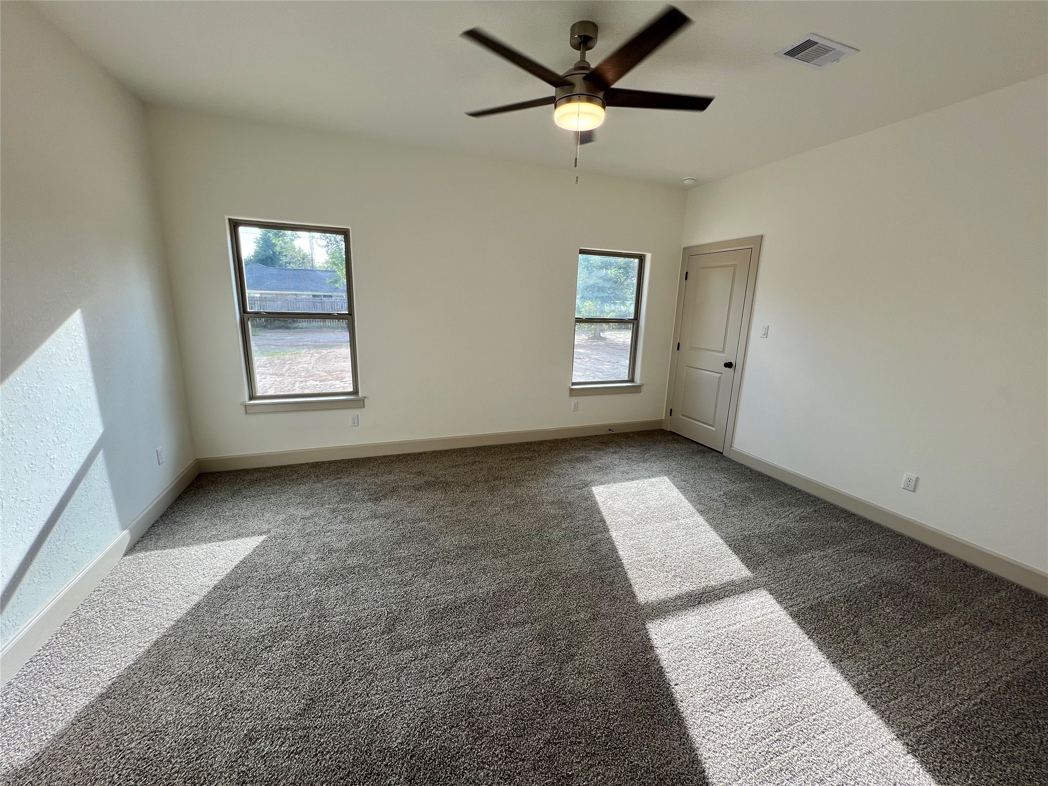 1003 South Anderson Street Angleton, TX 77515 - Photo 19 of 20 a view of an empty room with a window