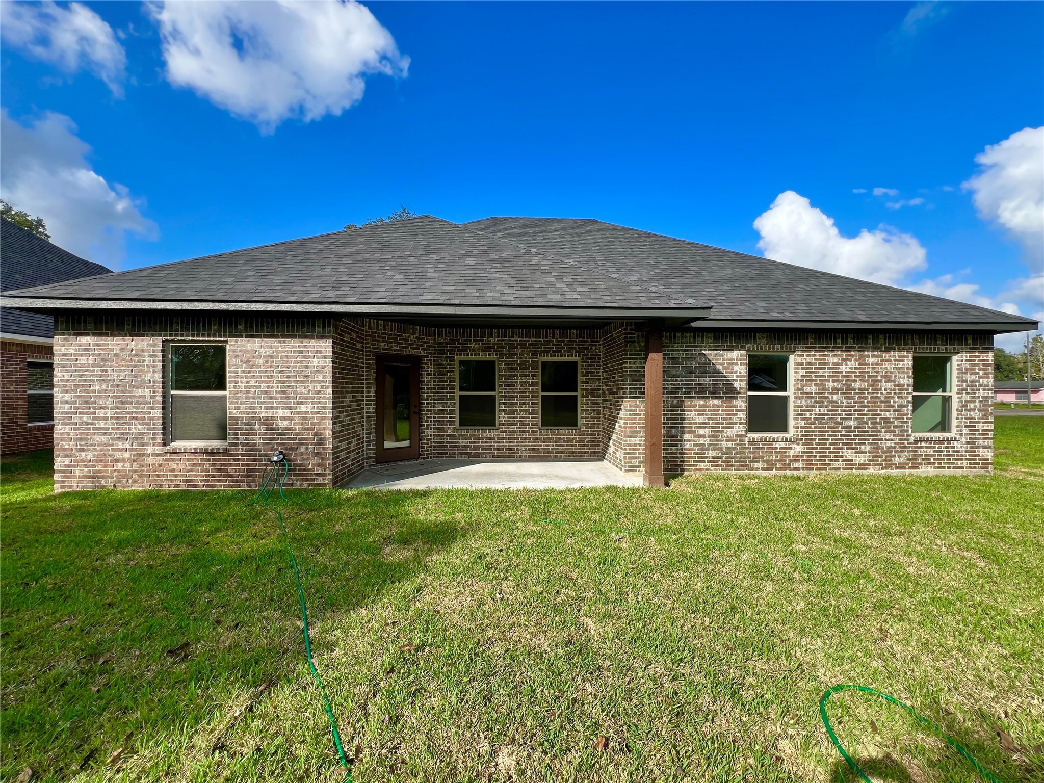 1003 South Anderson Street Angleton, TX 77515 - Photo 20 of 20 a front view of a house with garden