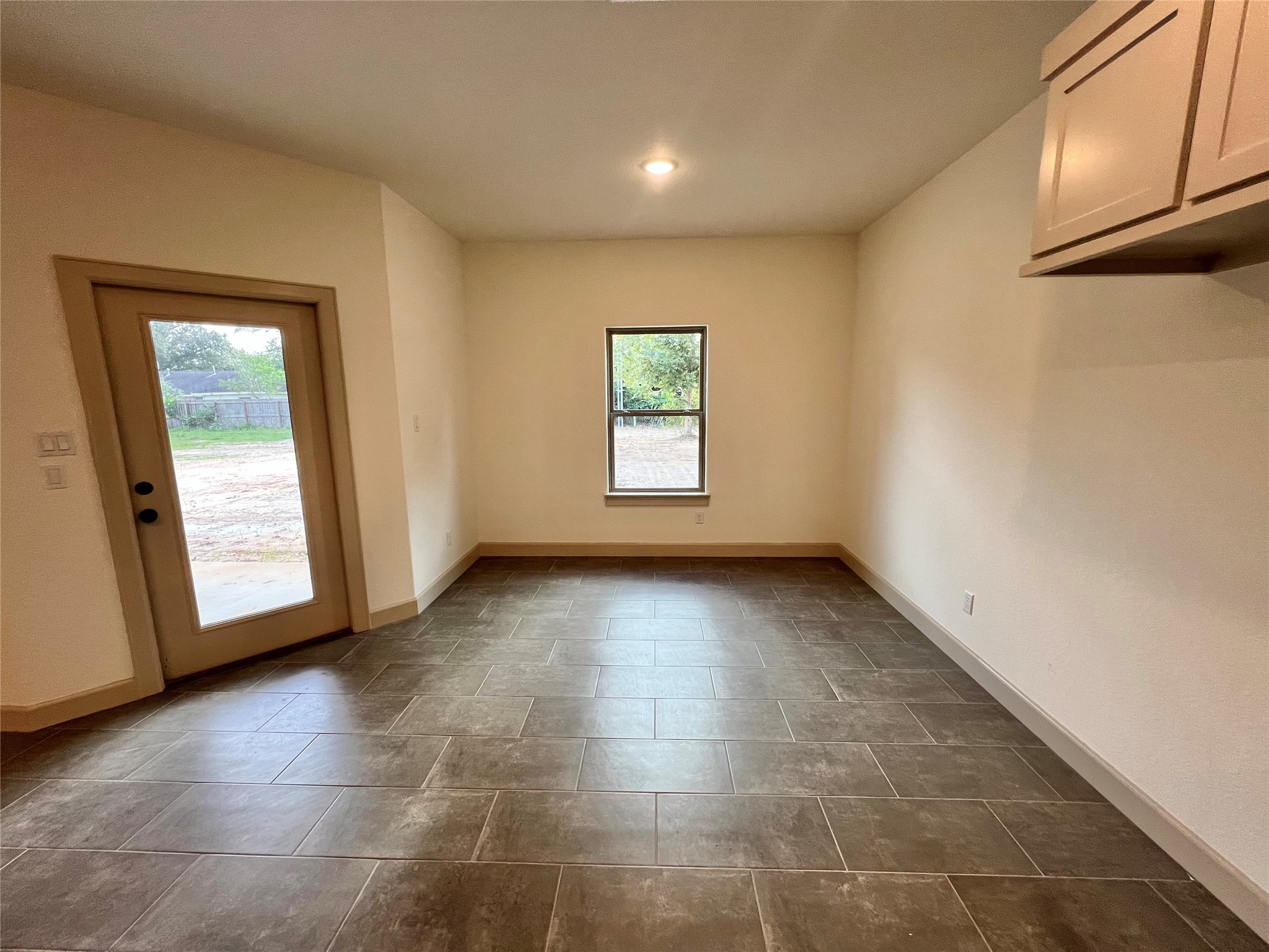 1003 South Anderson Street Angleton, TX 77515 - Photo 10 of 20 a view of an empty room with a window