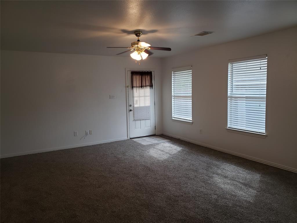 13631 Biggs Street Dallas, TX 75253 - Photo 11 of 17 a view of an empty room with a window