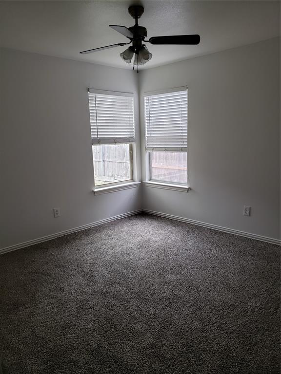 13631 Biggs Street Dallas, TX 75253 - Photo 12 of 17 a view of a room that has a window in it