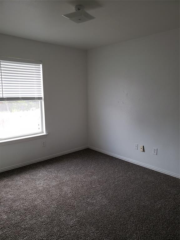 13631 Biggs Street Dallas, TX 75253 - Photo 7 of 17 an empty room with a window
