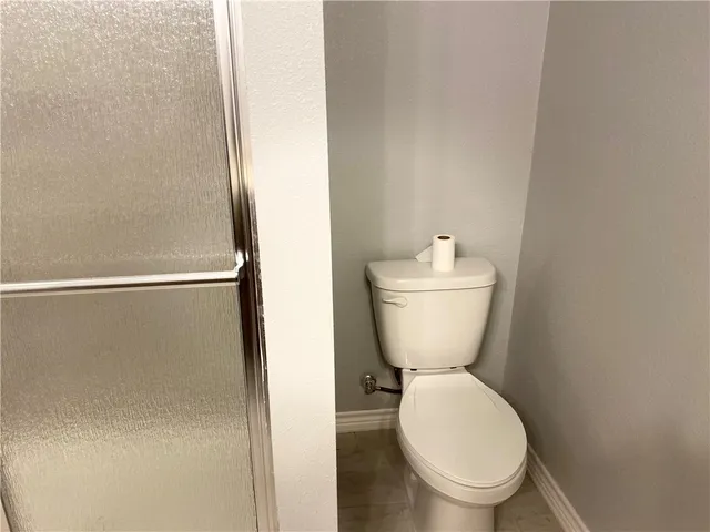 a bathroom with a toilet