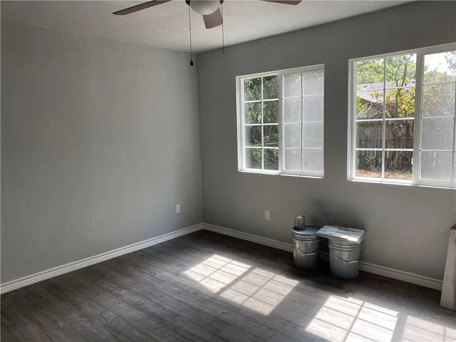 an empty room with windows