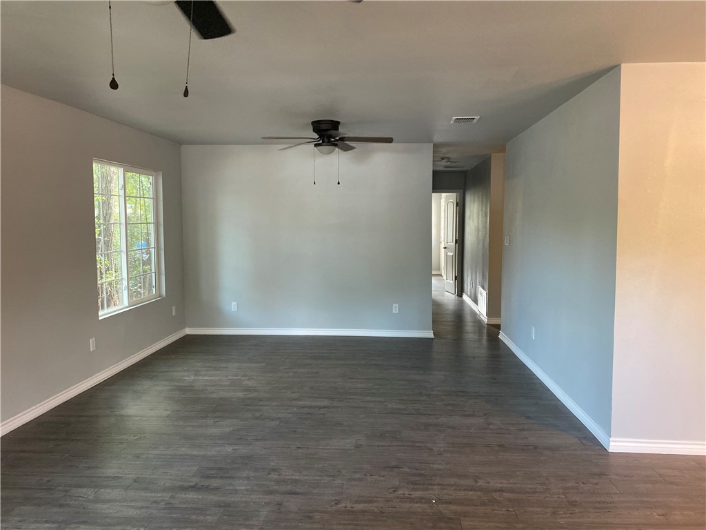 6107 Carnation Terrace Austin, TX 78741 - Photo 7 of 27 a view of an empty room with a window