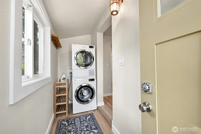a view of storage and utility room with washer and dryer
