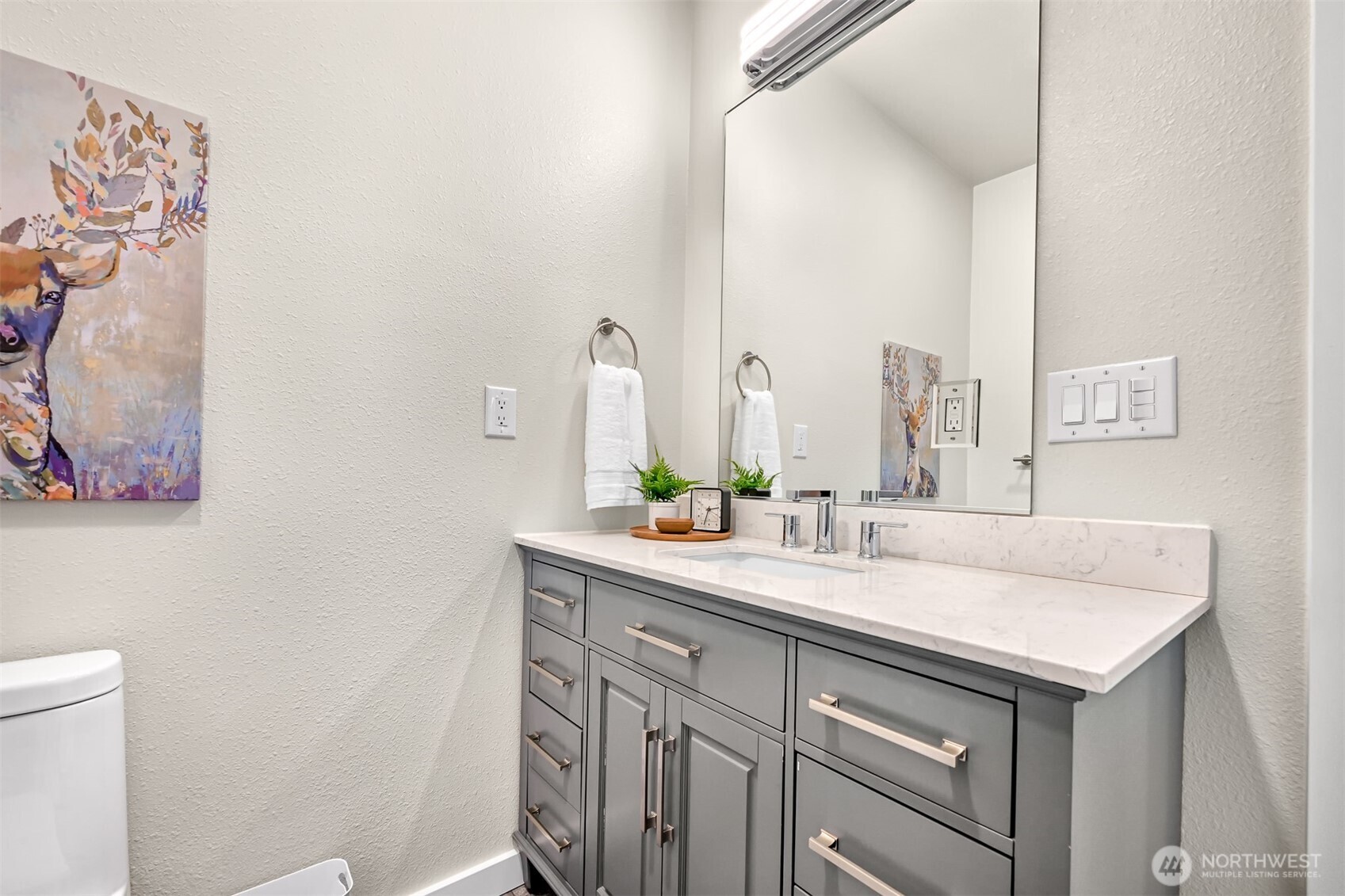 1027 21st Street Bellingham, WA 98225 - Photo 22 of 29 a bathroom with a sink and a mirror