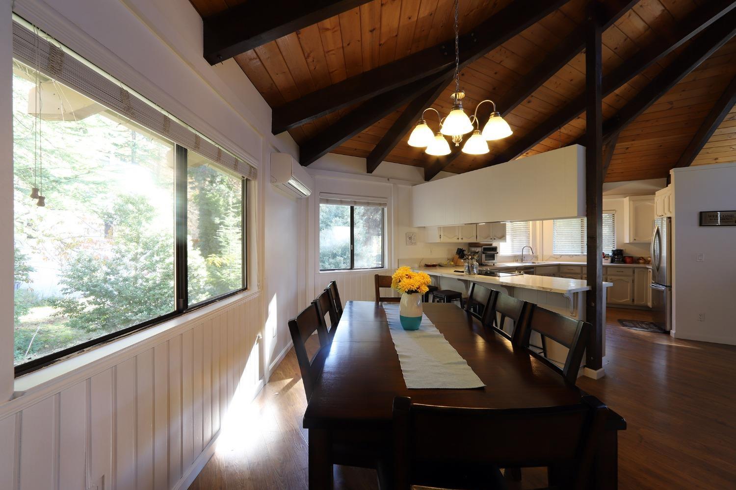 1870 Cable Road Camino, CA 95709 - Photo 21 of 36 a view of a dining room with furniture window and wooden floor