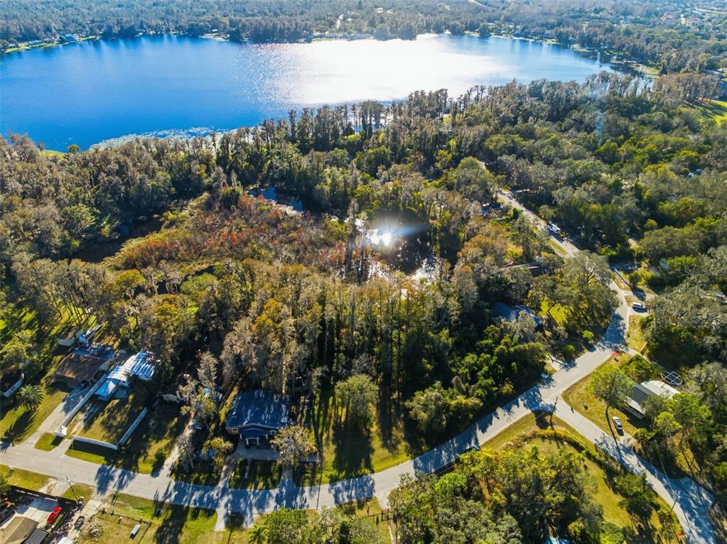 0 Moon Lake Circle New Port Richey, FL 34654 - Photo 2 of 22 a view of a lake with a lake