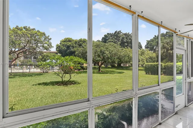 a view of a lake with a yard