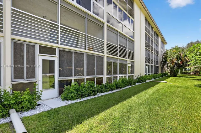 a view of a swimming pool with a garden