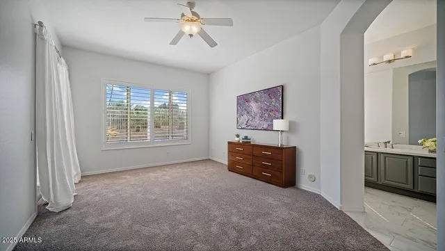 a view of workspace with furniture and cabinet