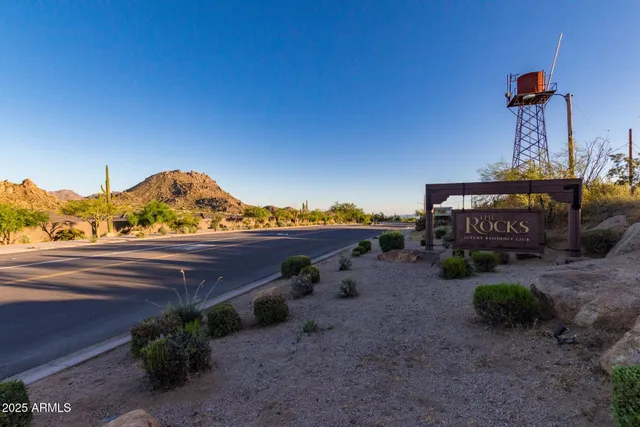 a view of a street with an ocean view