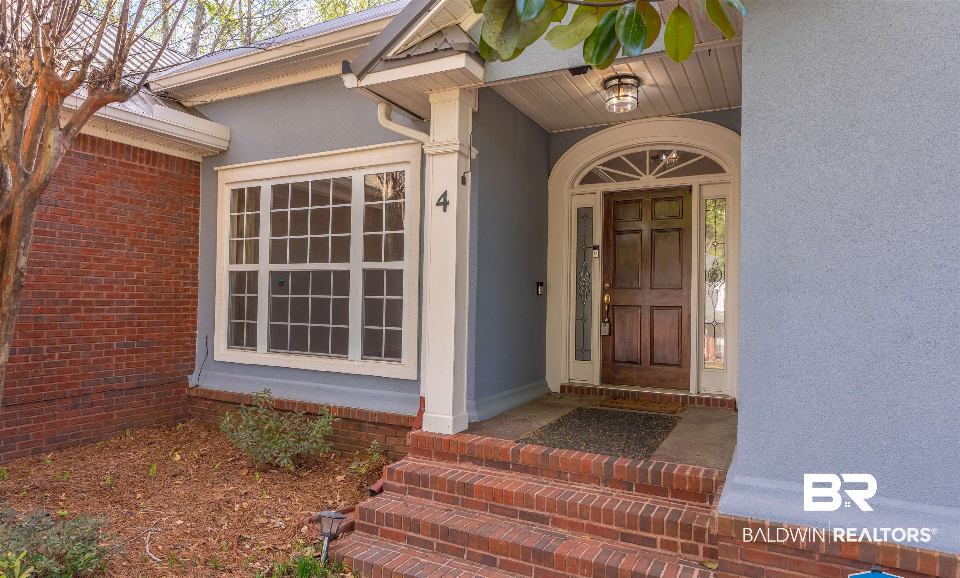 4 Judd Trail Daphne, AL 36527 - Photo 3 of 45 Property entrance featuring stucco siding and brick siding