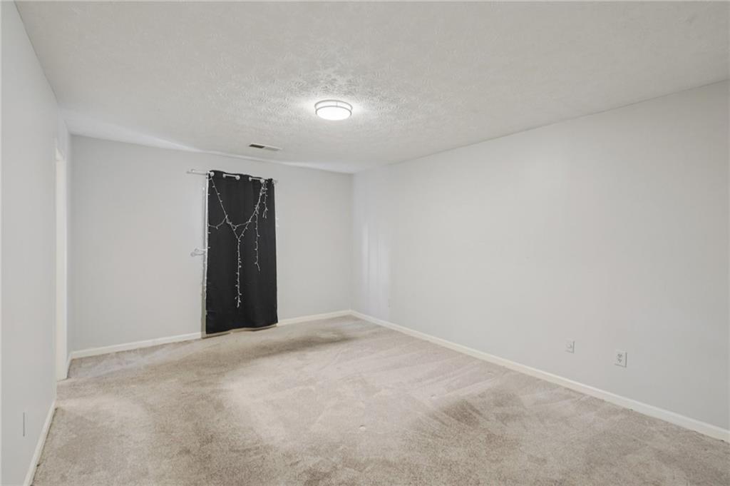 1145 Christian Circle Southeast Conyers, GA 30013 - Photo 12 of 18 a view of an empty room