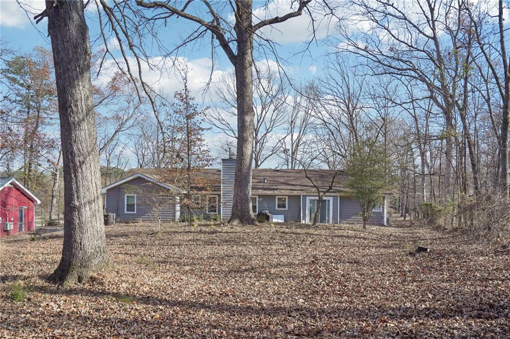 1145 Christian Circle Southeast Conyers, GA 30013 - Photo 16 of 18 front view of a house with a yard