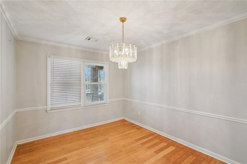 1145 Christian Circle Southeast Conyers, GA 30013 - Photo 6 of 18 a view of empty room with window