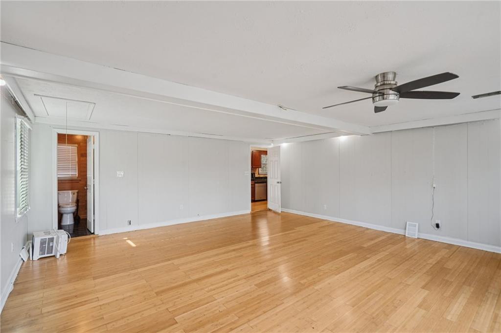 1145 Christian Circle Southeast Conyers, GA 30013 - Photo 10 of 18 wooden floor in an empty room