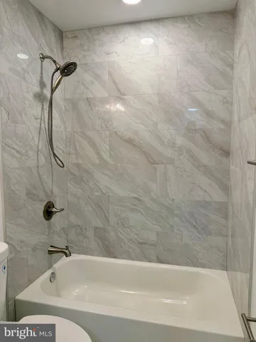 a bathroom with a bathtub