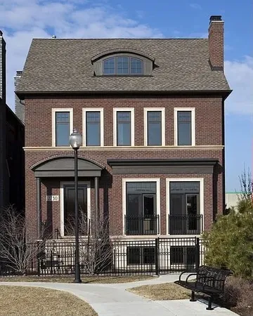 a view of a building with a yard