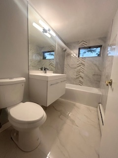 2215 West 111th Street, Unit 101 Chicago, IL 60643 - Photo 18 of 39 a bathroom with a toilet and a shower