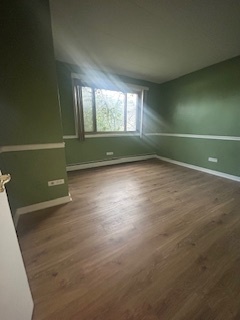 2215 West 111th Street, Unit 101 Chicago, IL 60643 - Photo 19 of 39 a view of an empty room with a window