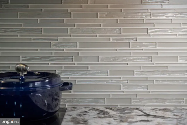 a view of a dining room with furniture wooden floor and chandelier