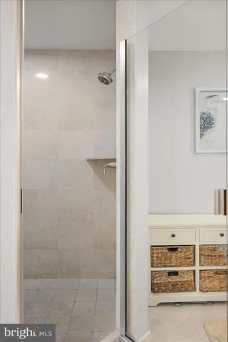 a view of a hallway with washer and dryer