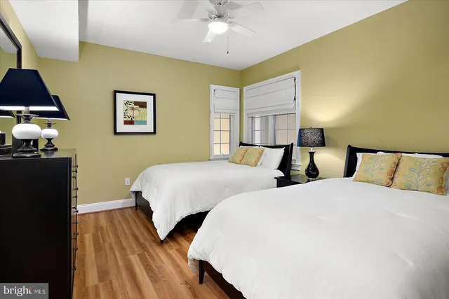 a front view of a residential apartment building with a glass door